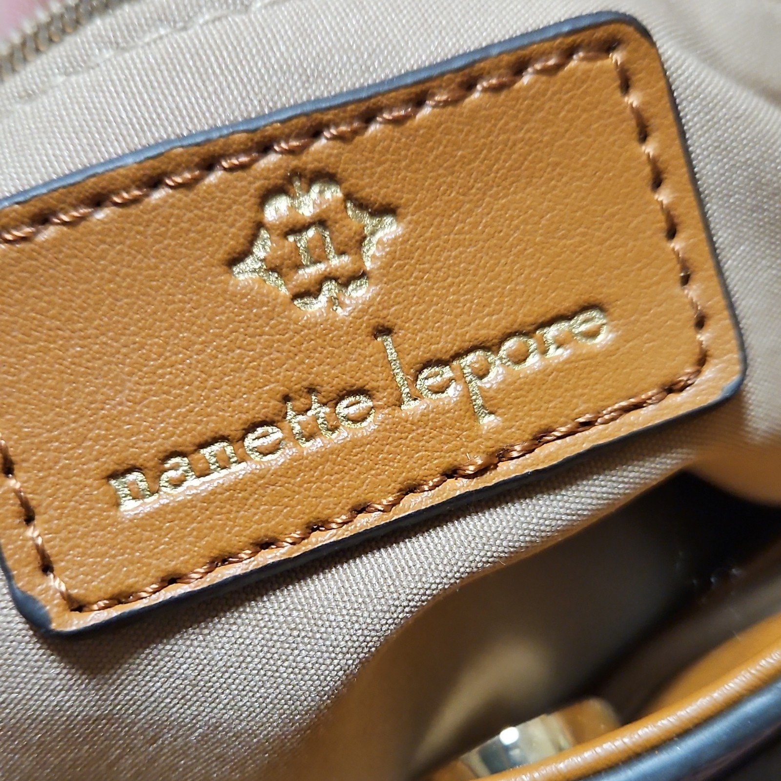 Nanette Lepore Brown Logo Crescent Shoulder Bag Braided Strap Zip Closure