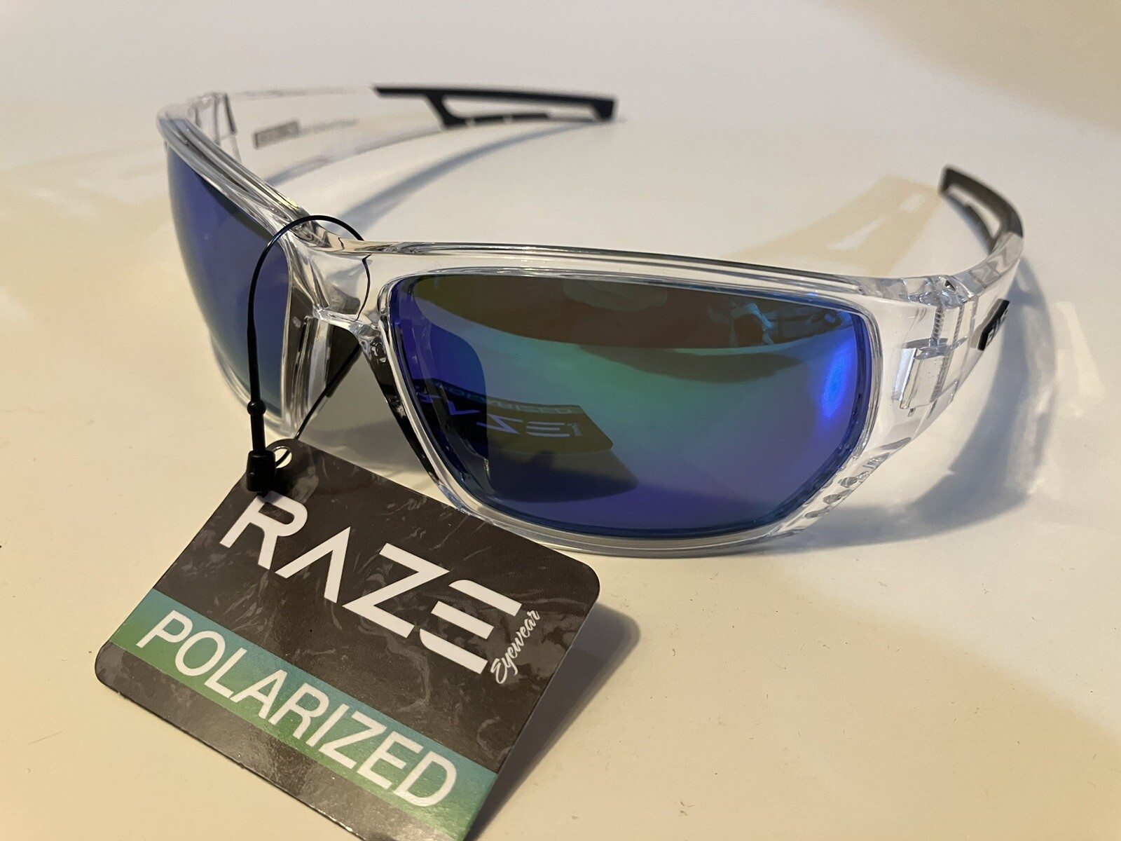 RAZE Eyewear Sunglasses Sonar Polarized Clear Frame Blue Mirror Smoke 28856