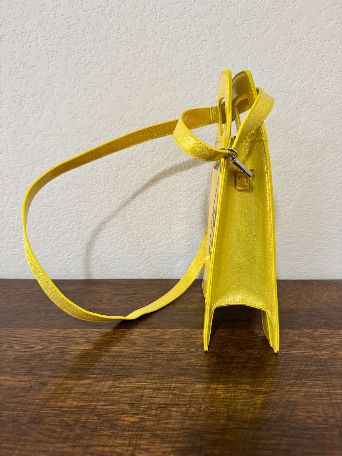 Dolls Kill Glitter Caution Slippery When Wet Crossbody Purse Yellow Novelty Bag