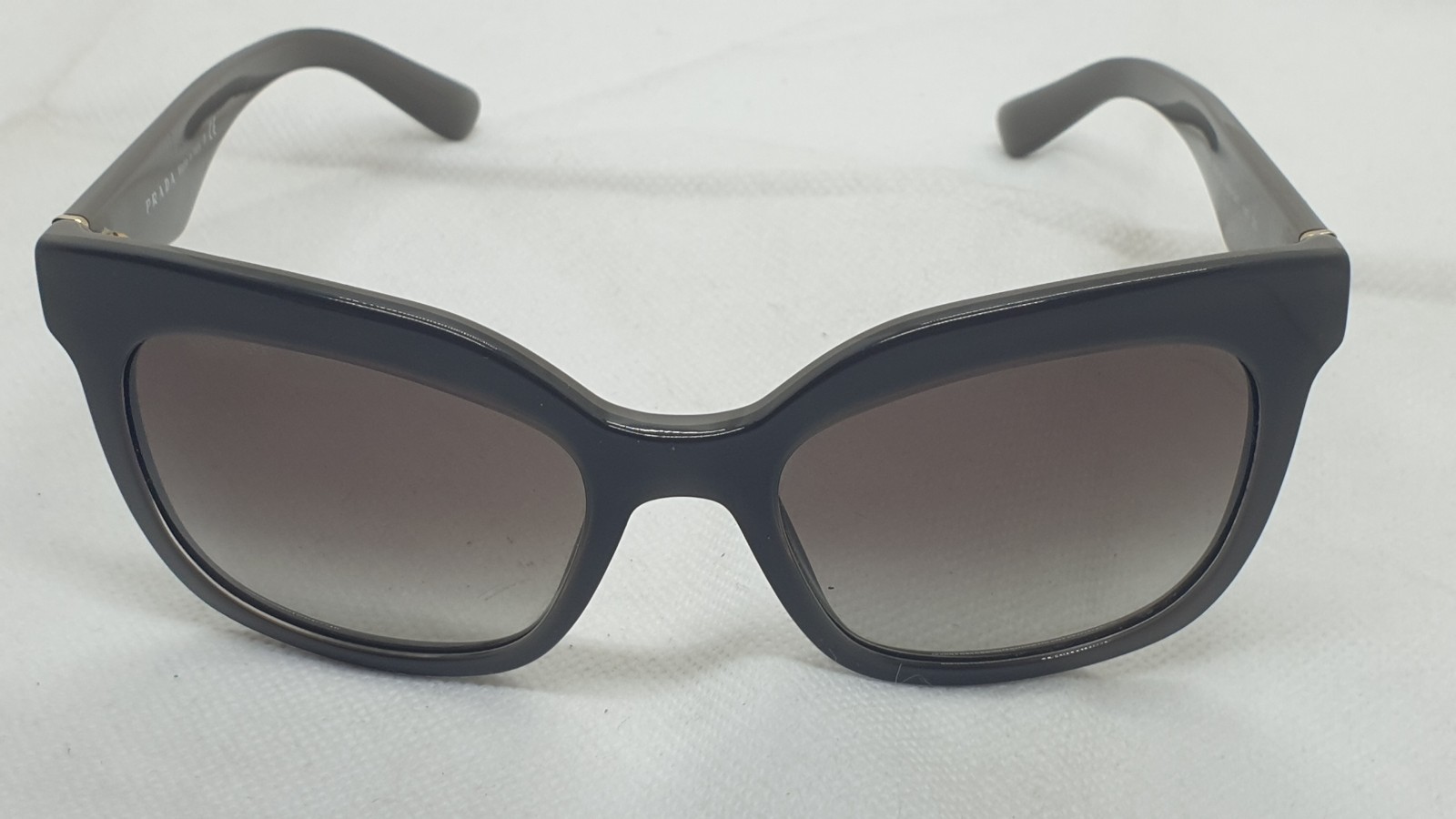Prada SPR 24Q UAM-0A7 Sunglasses. Made in italy